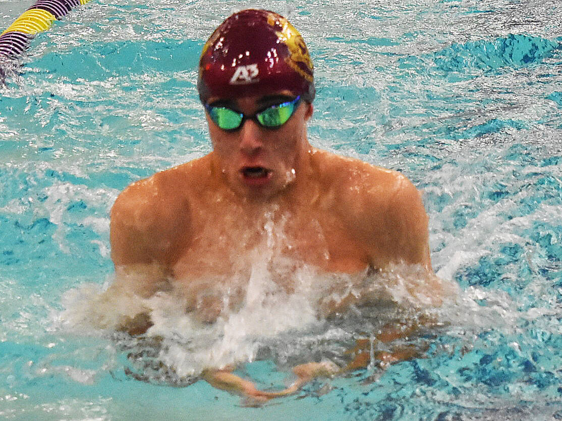 Nicholas Zeller-Singh/Kitsap News Group Photos
Buc Zachary Cummings wins the 100-yard breaststroke with 1:06.78.