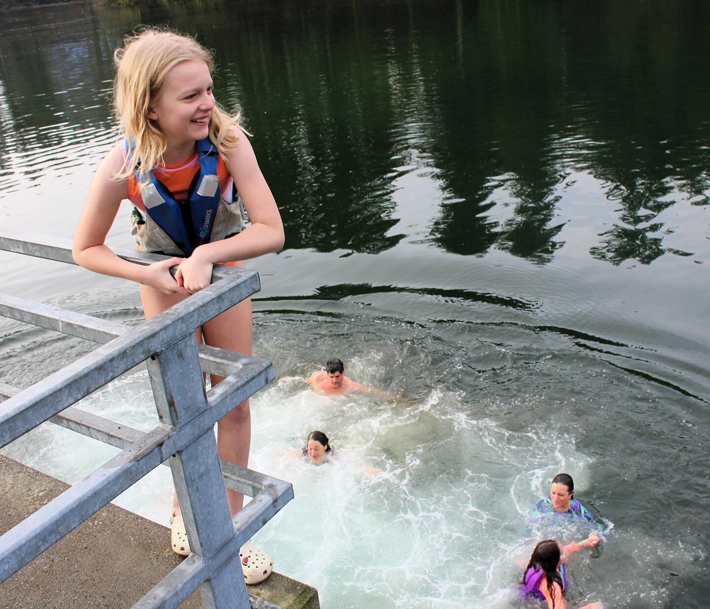 Elisha Meyer/Kitsap News Group Photos
‘Wait, was I supposed to go?’ Charlotte Burcar says after watching the rest of her family take the plunge in Olalla. Yes, she did too.