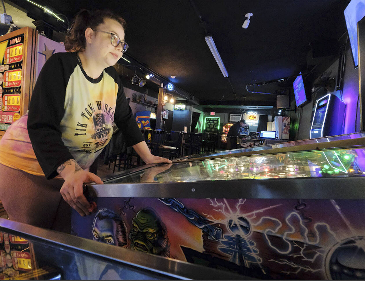 Damon Williams/Kitsap News Group Photos
Jessica Barron plays a pinball machine at a recent tournament in Bremerton.