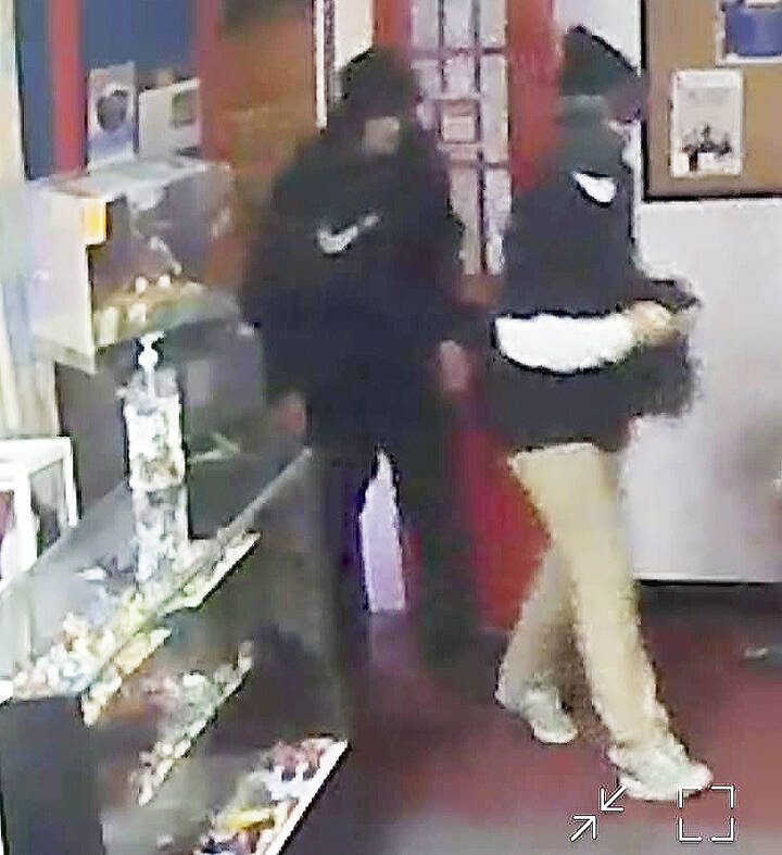 Brick Ally courtesy photos
Two individuals shown on security footage break in through the front door of Brick Ally.