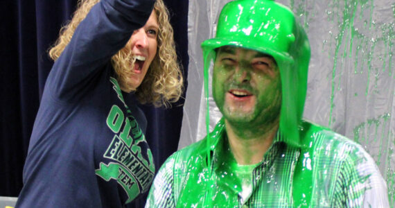 Headshot! Principal Ted Macomber takes a shot of slime to the face.
.