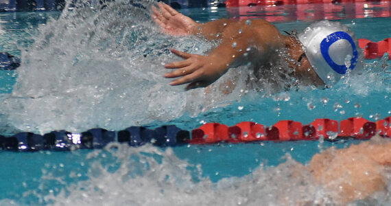 Nicholas Zeller-Singh/Kitsap News Group Photos
Trojan Jerrick Castillo does the breaststroke for the relay team.