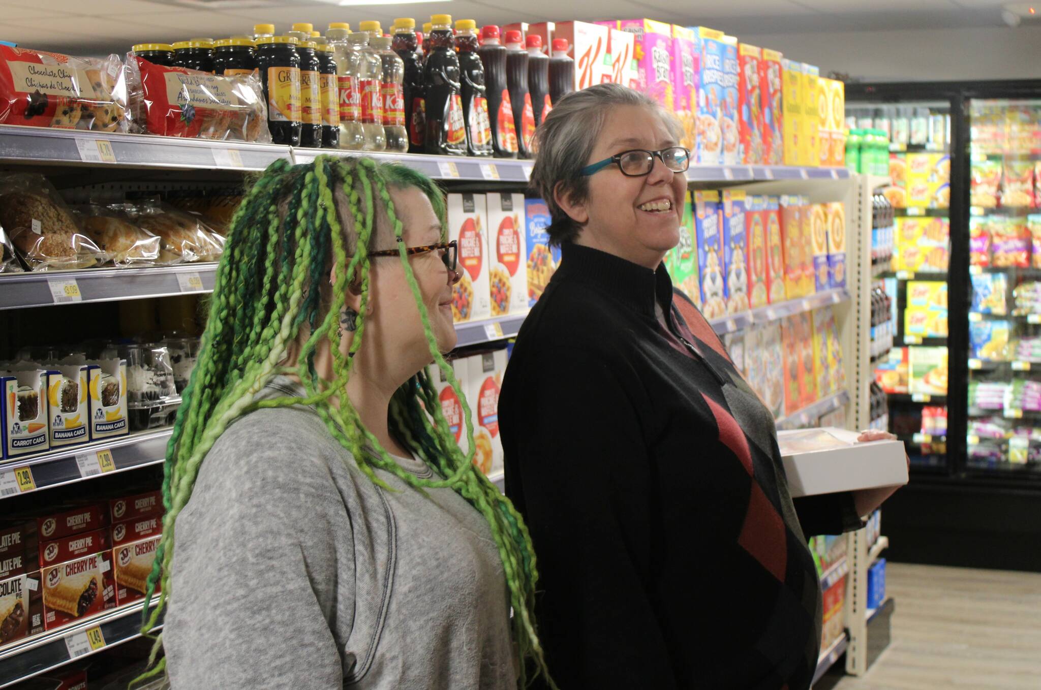 Elisha Meyer/Kitsap News Group photos
Lisa Ragsdale, right, makes a return to her local Midtown Market for a grocery run.