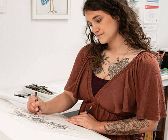 Leah Thompson Photography courtesy photo
Local artist Ana Dueñas sketches a drawing at Stinging Nettle Studio in Kingston.