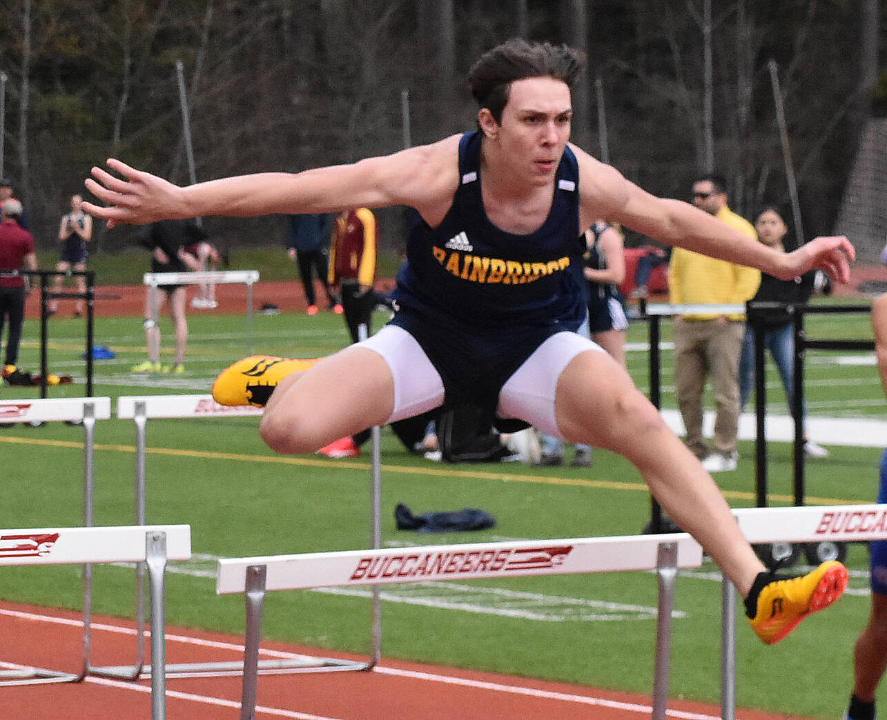 Nicholas Zeller-Singh/Kitsap News Group photos
Spartan Isaiah Beyer wins the 110 hurdles in 17.38.