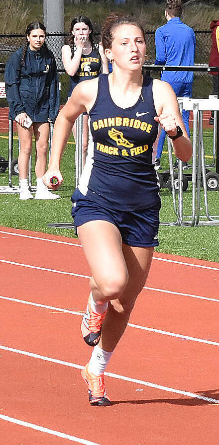 File photo
Bainbridge’s Laine Romney finishes second in the 100-meter event.