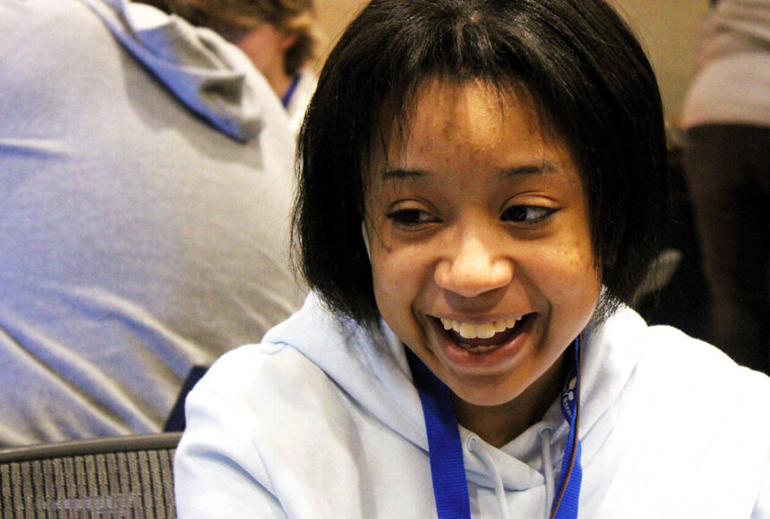 <p>Elisha Meyer/Kitsap News Group photos</p>
                                <p>Mihelia Thomas, 16, shares a smile with her sister during a tabletop game.</p>
