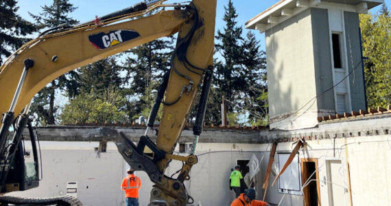 Molly Hetherwick/Kitsap News Group
Demolition began April 10 on the old Police Station on Winslow Way E. on Bainbridge Island just above the Washington State Ferries dock. The city plans to put affordable housing there. The demolition has been controversial as the city’s Historic Preservation Commission walked out en masse last week because their stance was not respected by leaders, they said.