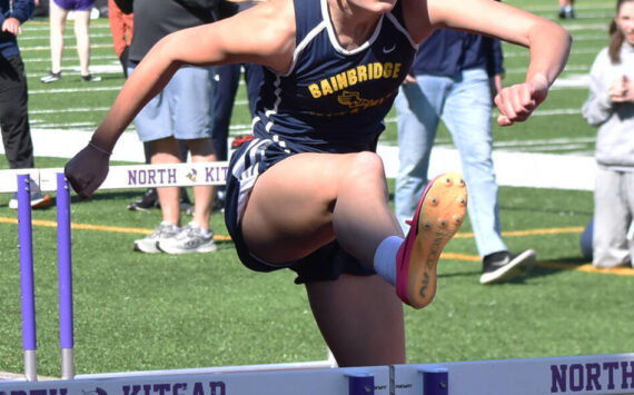 Spartan Claire Hungerford wins the 100 hurdles. Nicholas Zeller-Singh/Kitsap News Group Photos