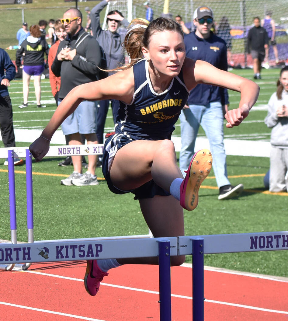 Nicholas Zeller-Singh/Kitsap News Group Photos
Spartan Claire Hungerford wins the 100 hurdles.