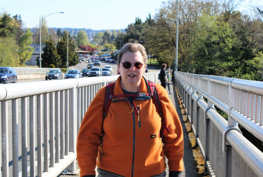 <p>Elisha Meyer/Kitsap News Group</p>
                                <p>Kandace MacKaben takes to her walk up the narrow Warren Avenue walkway on the west side of the bridge.</p>