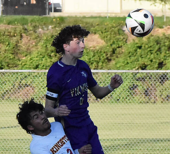 <p>Nicholas Zeller-Singh/Kitsap News Group photos</p>
                                <p>Viking Harper Sabari leaps over the Kingston defender to head the ball. </p>