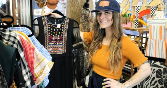 Elisha Meyer/Kitsap News Group
Brittany Hess shows off the collection of spring and summer wear in her new storefront.