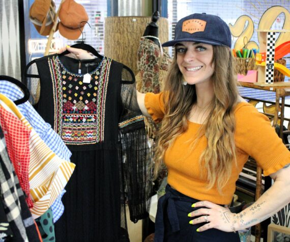 Elisha Meyer/Kitsap News Group
Brittany Hess shows off the collection of spring and summer wear in her new storefront.