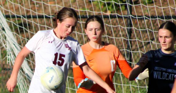 Elisha Meyer/Kitsap News Group photos
SK senior Sierra Defevers works quickly to try and force the ball into the Crosspoint goal.