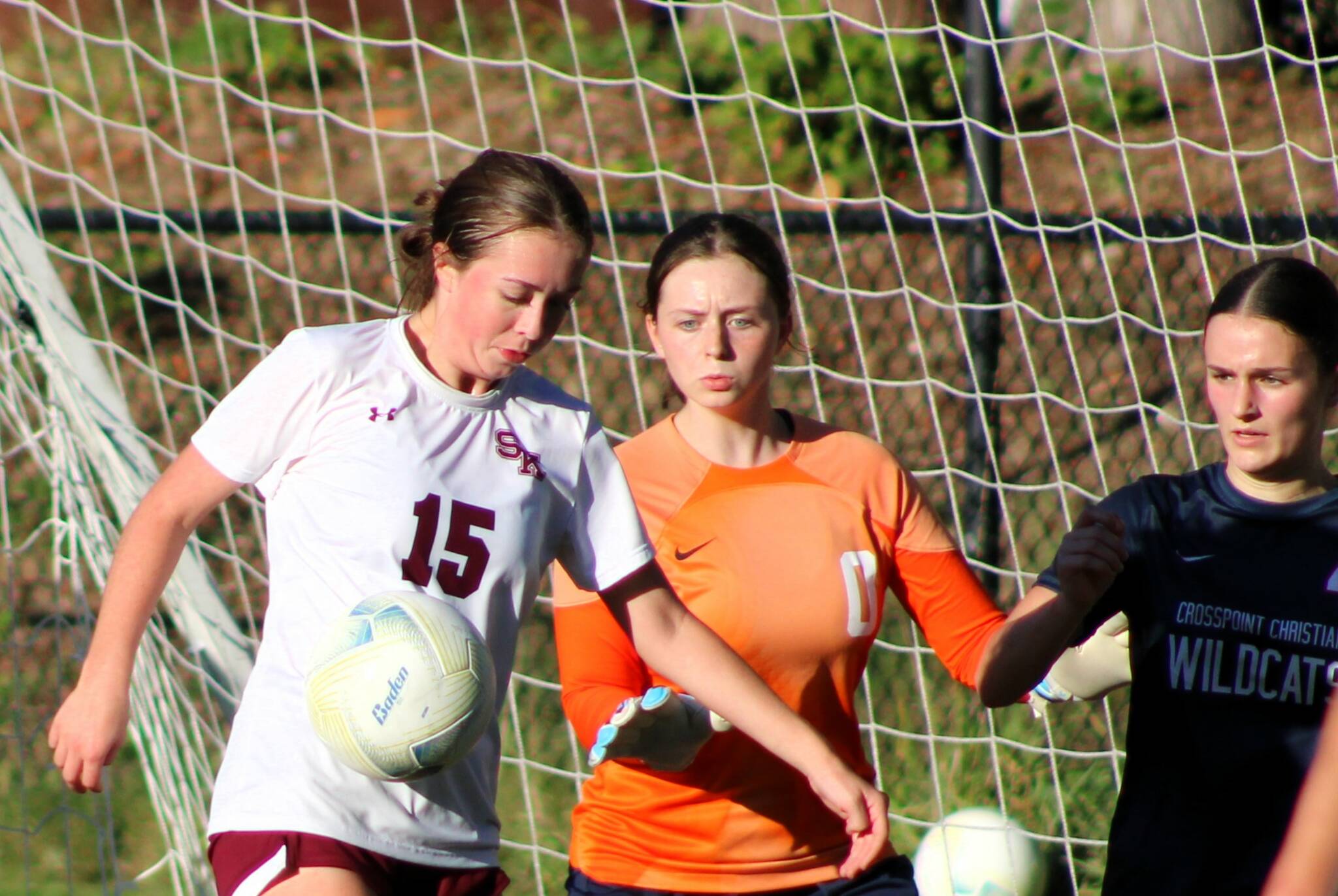 Elisha Meyer/Kitsap News Group photos
SK senior Sierra Defevers works quickly to try and force the ball into the Crosspoint goal.