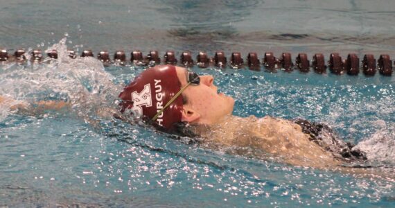 Elisha Meyer/Kitsap News Group photos
Emma Hurguy enters the backstroke phase of her 200-yard individual medley race.