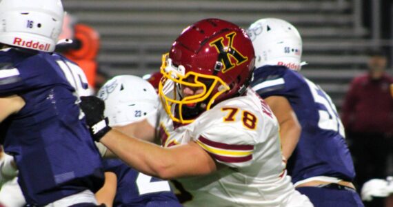 Elisha Meyer/Kitsap News Group photos
Kingston Junior offensive lineman Jack Grady tries to keep a pass rusher contained.