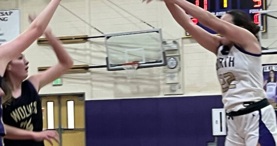 Luke Caputo/Kitsap News Group
NK senior forward Teegan DeVries goes up for a jump shot in the first quarter of a game against Sequim Jan. 10.