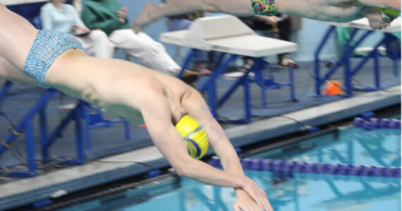 Luke Caputo/Kitsap News Group
Bainbridge swimmers diving into the pool in a match against the Bremerton Knights Jan. 15 at Bainbridge High School.