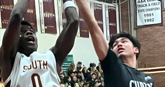 Luke Caputo/Kitsap News Group photos
South Kitsap senior Josiah Blunt-Robinson drives for a contested layup in a 55-42 loss to the Curtis Vikings Jan. 22.
