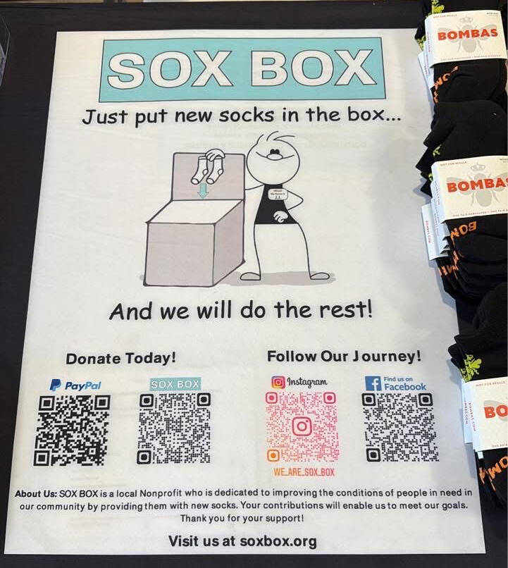 Foto yang disediakan oleh Sox Box Sox Box of Bellevue menyediakan kaus kaki kering yang bersih untuk orang -orang yang tidak memiliki alamat permanen di acara tersebut.