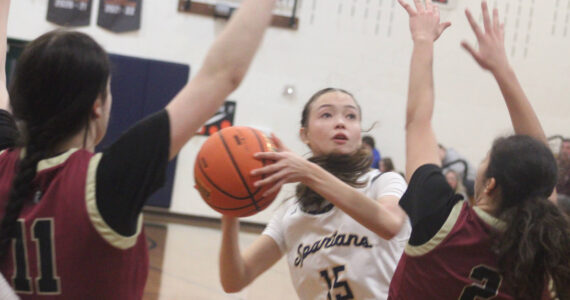 Luke Caputo/Kitsap News Group
Spartan Kaela Cole goes up for a layup in a 71-51 win over Kingston in the district 2A girls basketball tournament at Bainbridge High School Feb. 18.