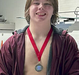 South Kitsap High School courtesy photo
SK senior diver Karter Warner wearing his 2nd place state medal.
