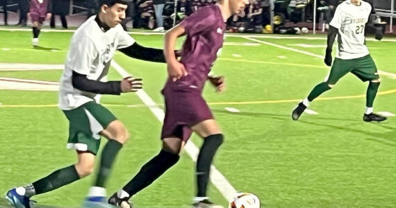 Luke Caputo/Kitsap News Group photos
SK midfielder Yuji Ehret dribbles the ball down the field in a 3-1 loss to the Evergreen Wolverines March 12 at South Kitsap High School.