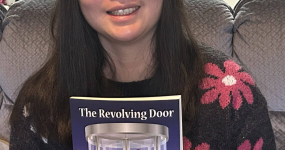 Helen Motokane courtesy photo
Christine Motokane pictured with her book ” The Revolving Door: The Story of Disability Support.”
