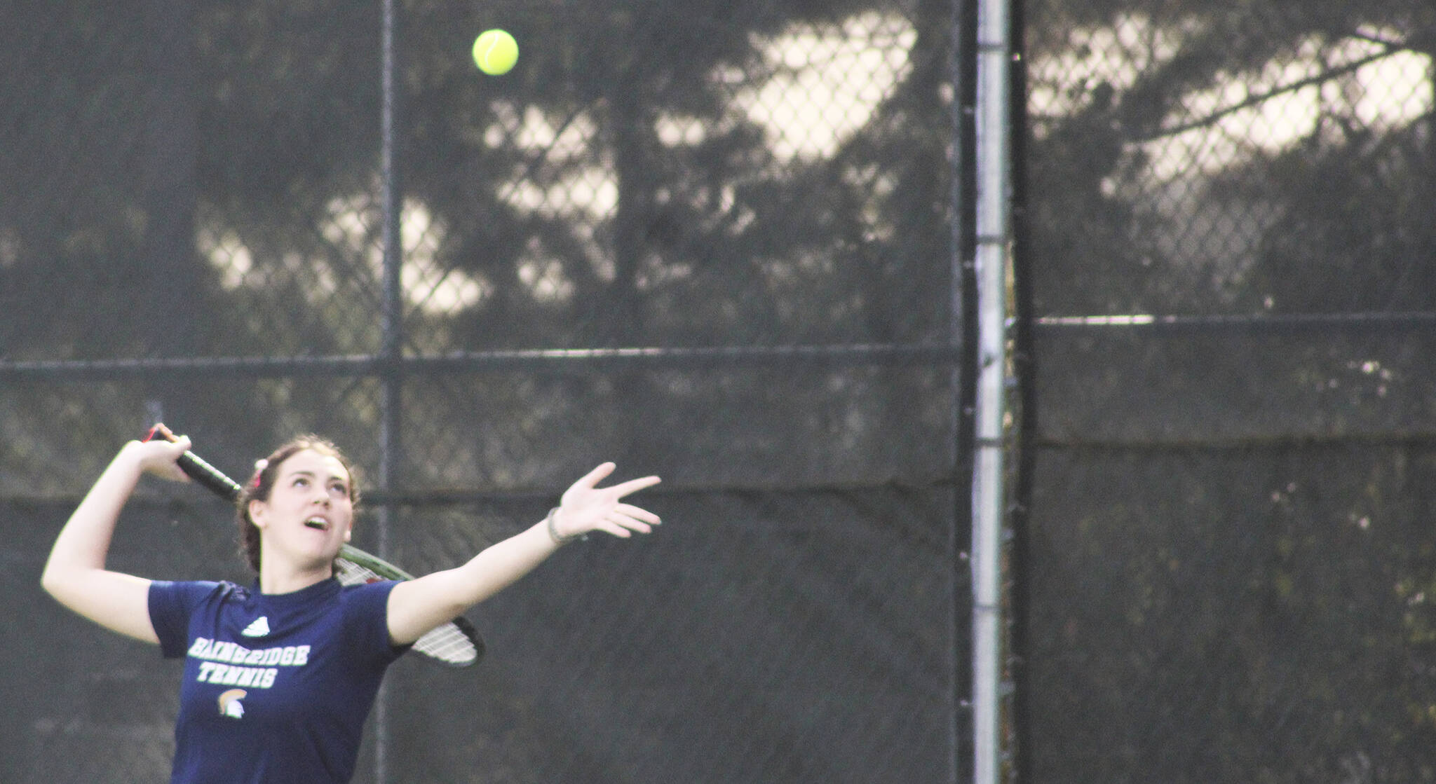 Luke Caputo/Kitsap News Group photos
Bainbridge’s Marta Llorens Casellas prepares to hit the ball in a match against Bremerton.