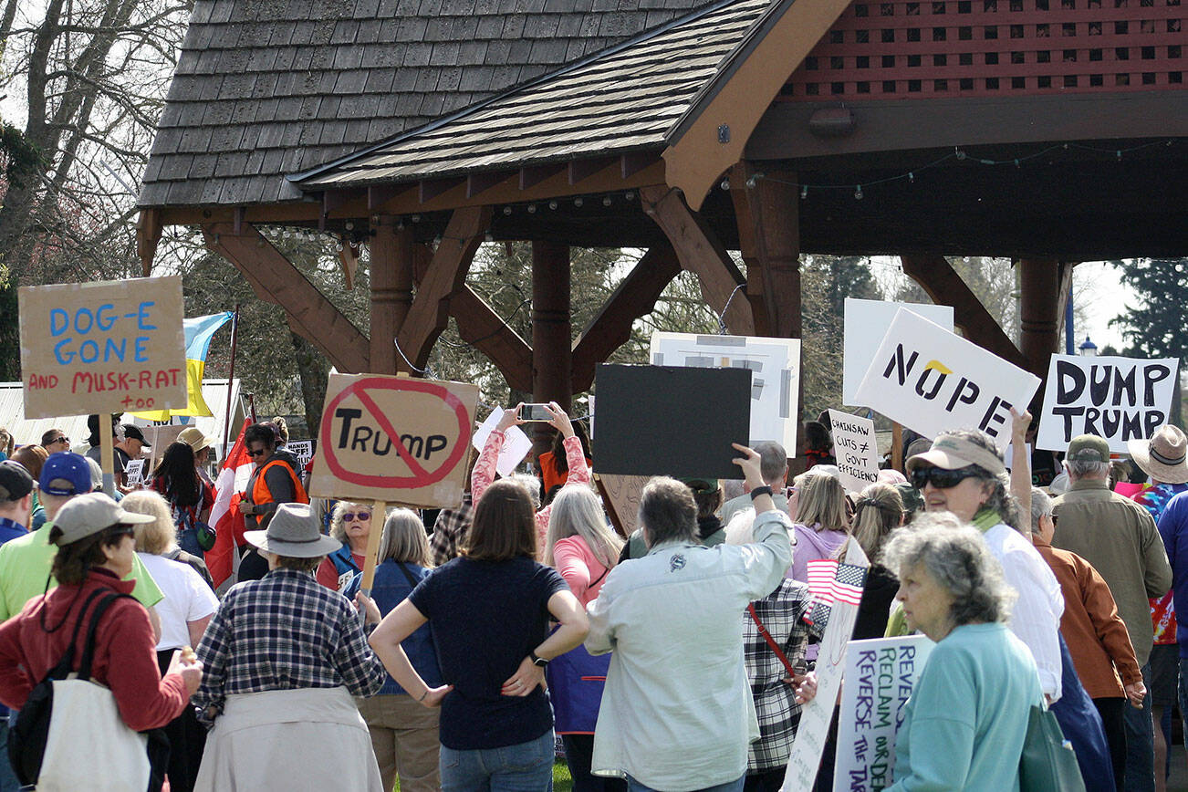 Tyler Shuey/Kitsap News Group photos
Over 2,000 community members showed up in downtown Poulsbo April 5 to protest against the Trump administration.