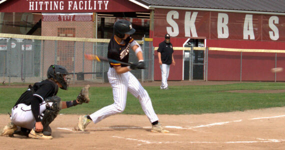 Luke Caputo/Kitsap News Group photos
Carson Puryear of South Kitsap prepares to swing at an incoming pitch in a 10-5 win over Bonney Lake in the first round of the SPSL 4A baseball tournament May 6 in Port Orchard.
