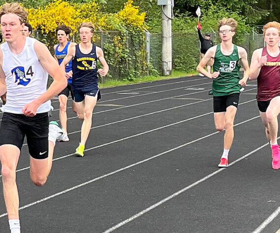 Luke Caputo/Kitsap News Group photos
Bremerton Knight Dallin Anderson leads the pack in a race at the Olympic League track and field championships May 8-10 at North Mason High School.