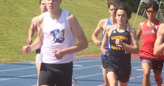 Luke Caputo/Kitsap News Group
Bremerton Knight Dallin Anderson (front) and Bainbridge Spartan Ignacio Llorens (back) compete in the 800M event at districts, May 21 at Bremerton High School.