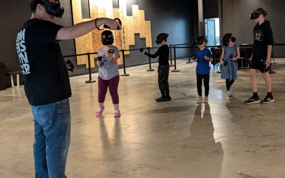 Sean Ong courtesy photos 
Campers wear VR headsets and ‘travel’ as a group to explore topics like the solar system, atoms and molecules, and natural environments.