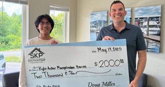 South Kitsap School District courtesy photos
Kyle Archer Mangalindan Barias (left) receives the $2,000 South Kitsap Community Pride Scholarship created by Doug Miller (right) and South Kitsap Properties.