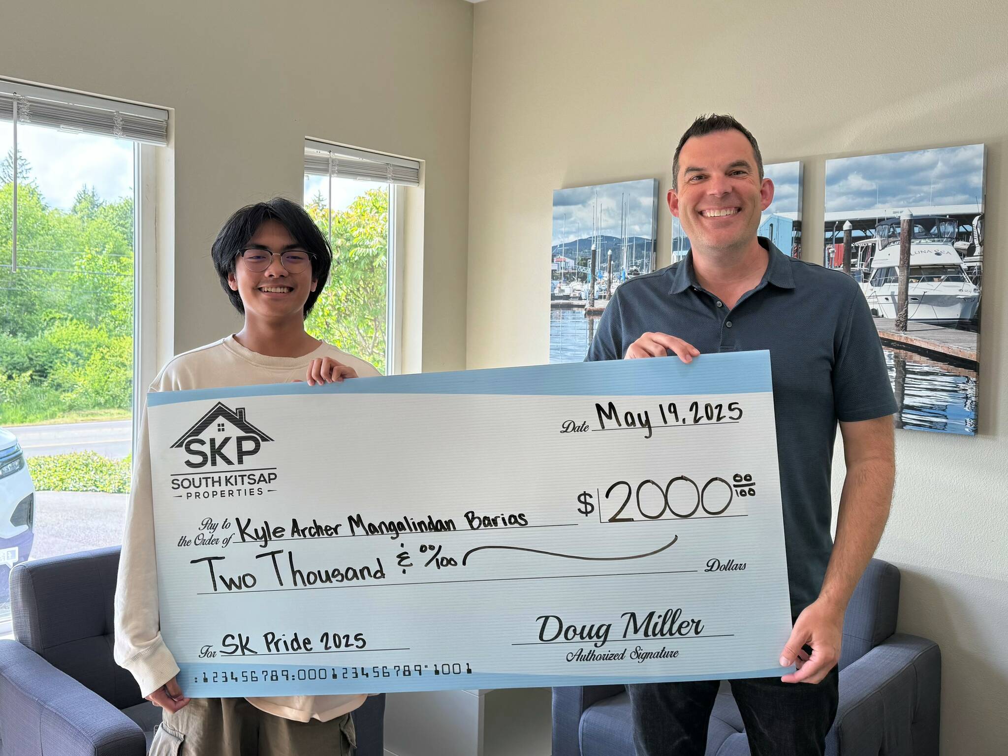 South Kitsap School District courtesy photos
Kyle Archer Mangalindan Barias (left) receives the $2,000 South Kitsap Community Pride Scholarship created by Doug Miller (right) and South Kitsap Properties.
