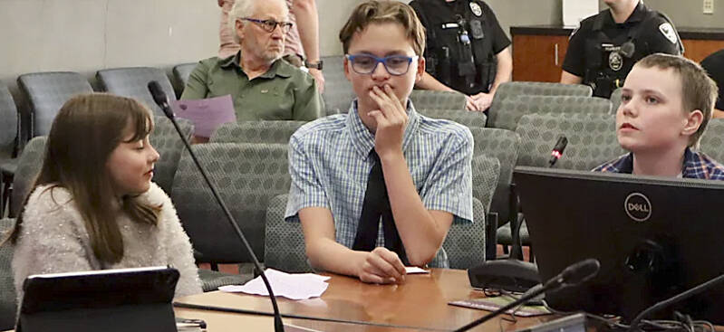 NKSD courtesy photo
Pearson students (left to right) Hunter Boag, Kal Gist, and Ryker Jones present updates on the Poulsbo Pollinator Project to the Poulsbo City Council May 21.
