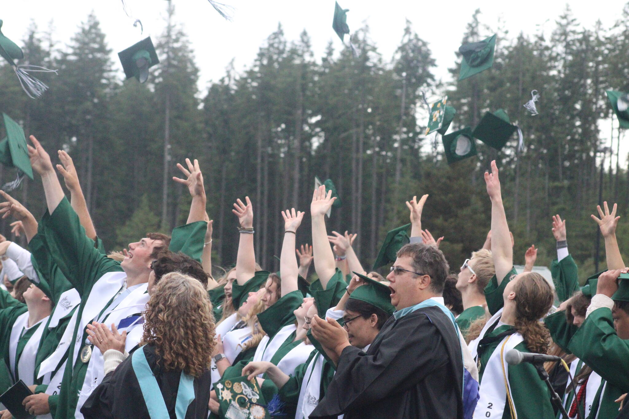 Luke Caputo/Kitsap News Group photos
The Klahowya class of 2025 throws their caps in the air at the end of the graduation ceremony June 13 at Silverdale Stadium.