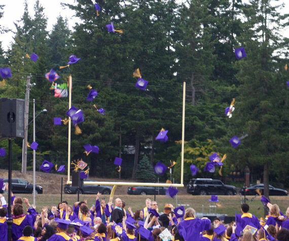 Tyler Shuey/Kitsap News Group photos
North Kitsap High School class of 2025 graduates throw their caps in the air at the conclusion of the ceremony June 13.