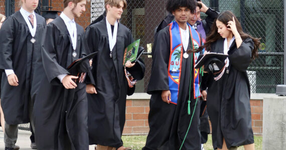 Britney Fletcher-West/Kitsap News Group photos
Central Kitsap High School graduates walk to meet their families following the ceremony June 14.