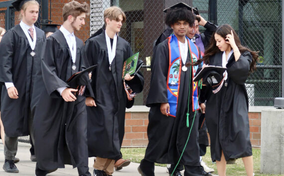 Britney Fletcher-West/Kitsap News Group photos
Central Kitsap High School graduates walk to meet their families following the ceremony June 14.