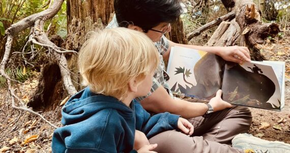 Tender Leaves courtesy photos
Head teacher and founder, Calvin Frey, reads to students at Salsbury Park during summer camp.