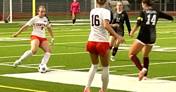 Luke Caputo/Kitsap News Group photos
Central Kitsap junior Rhylie Jones dribbles the ball through imposing South Kitsap defenders in a 2-0 Cougar win over the Wolves Sept. 4 in Port Orchard.