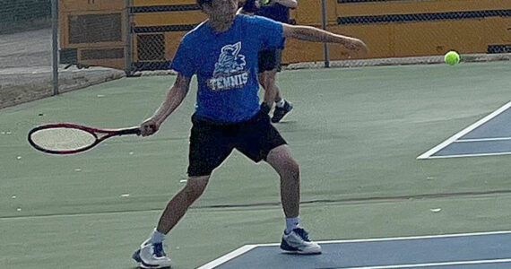 Luke Caputo/Kitsap News Group photos
Knight Eric Prewitt prepares to hit a forehand in a match against North Kitsap Sept. 9 in Bremerton.