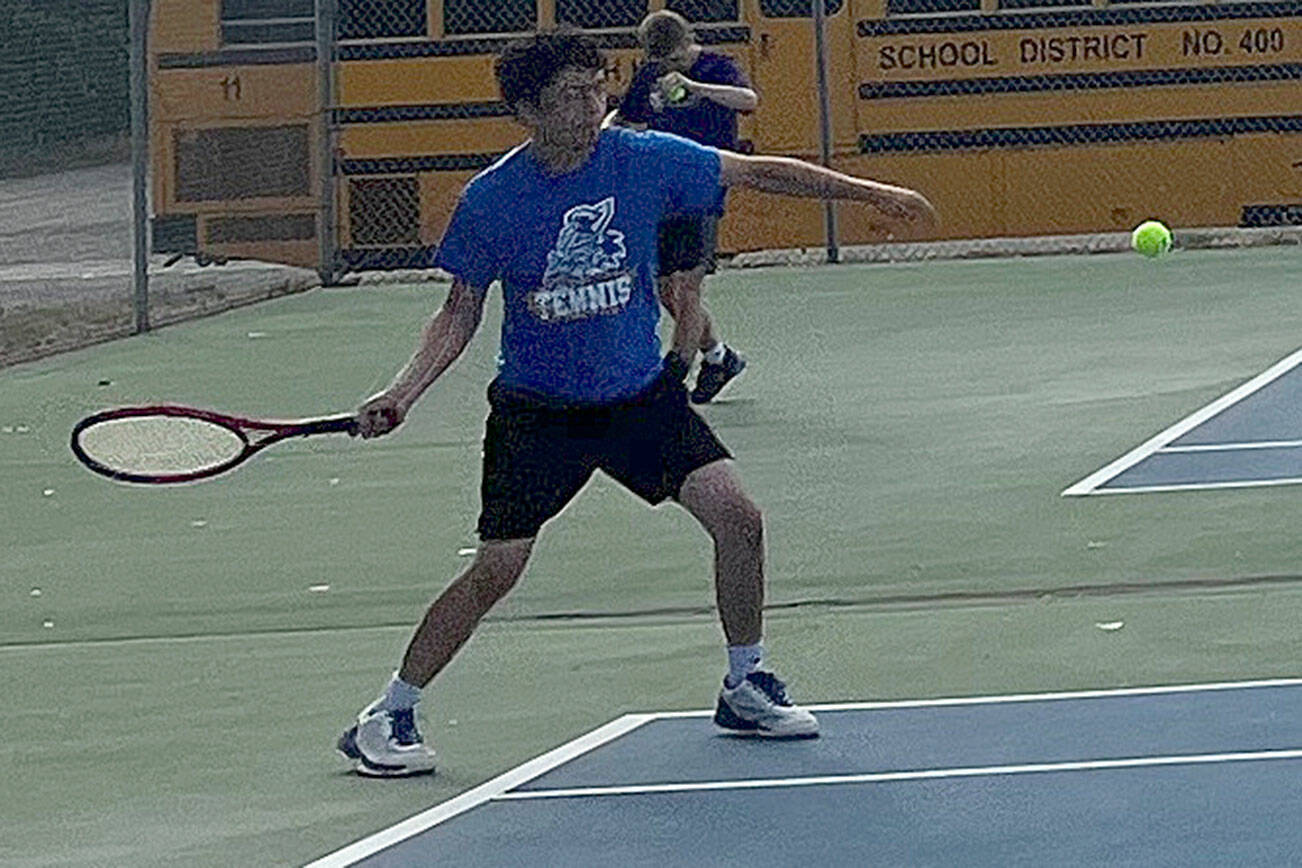 Luke Caputo/Kitsap News Group photos
Knight Eric Prewitt prepares to hit a forehand in a match against North Kitsap Sept. 9 in Bremerton.