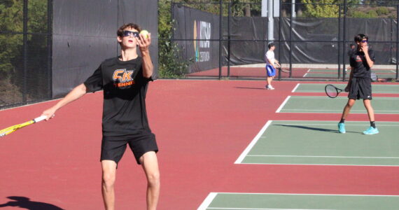 Luke Caputo/Kitsap News Group photos
Cougar Davis Mills prepares to serve in a match against Olympic Sept. 15 at Central Kitsap High School.