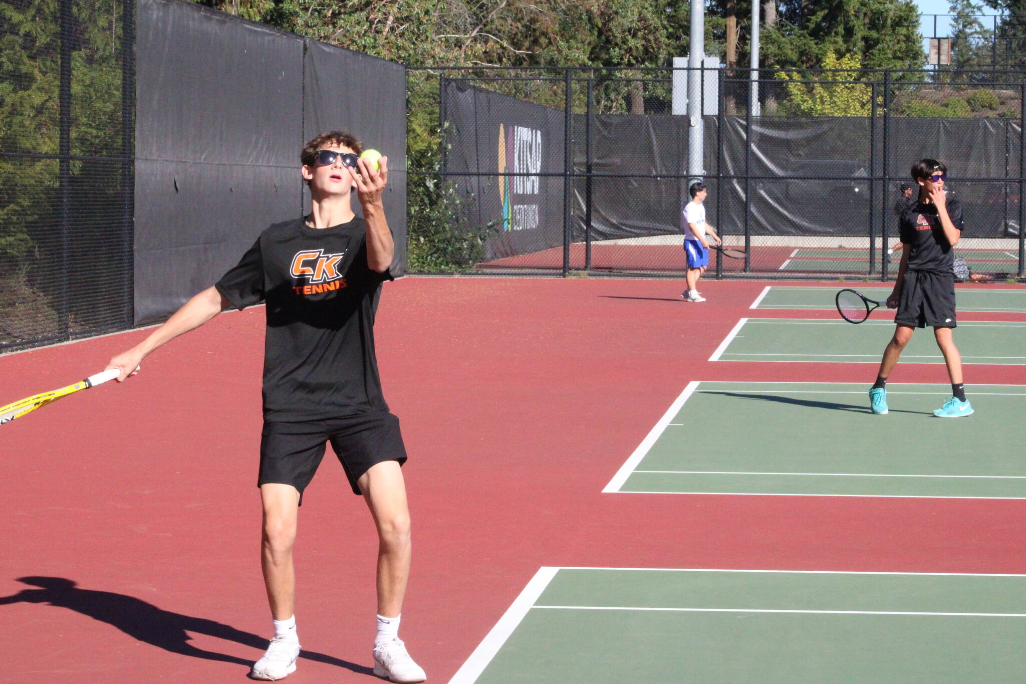 Luke Caputo/Kitsap News Group photos
Cougar Davis Mills prepares to serve in a match against Olympic Sept. 15 at Central Kitsap High School.