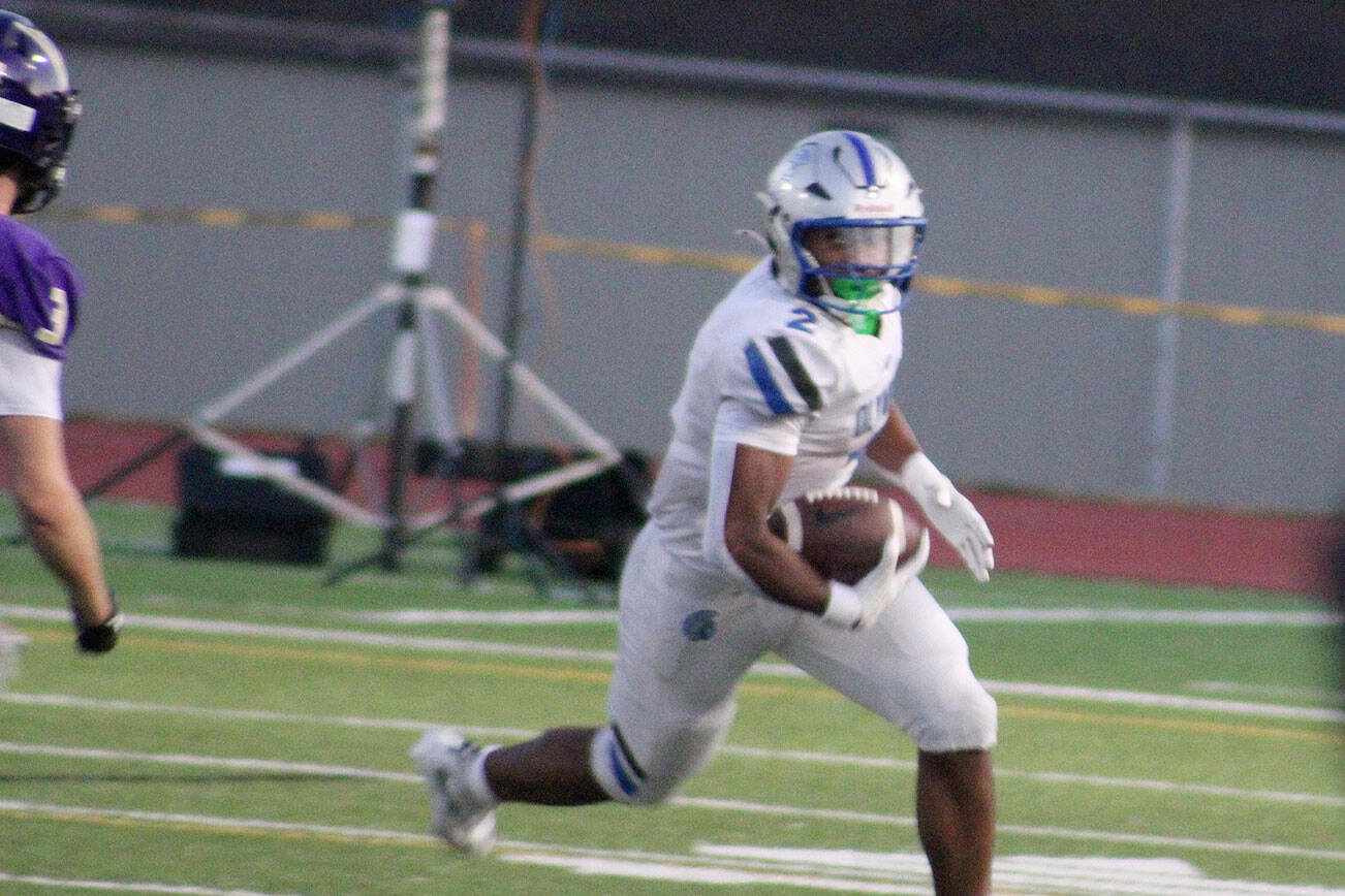 Luke Caputo/Kitsap News Group photos
Trojan running back Chace Webster rushed for over 200 yards and scored three touchdowns in a 27-14 Olympic win over the North Kitsap Vikings Sept. 18 in Poulsbo.